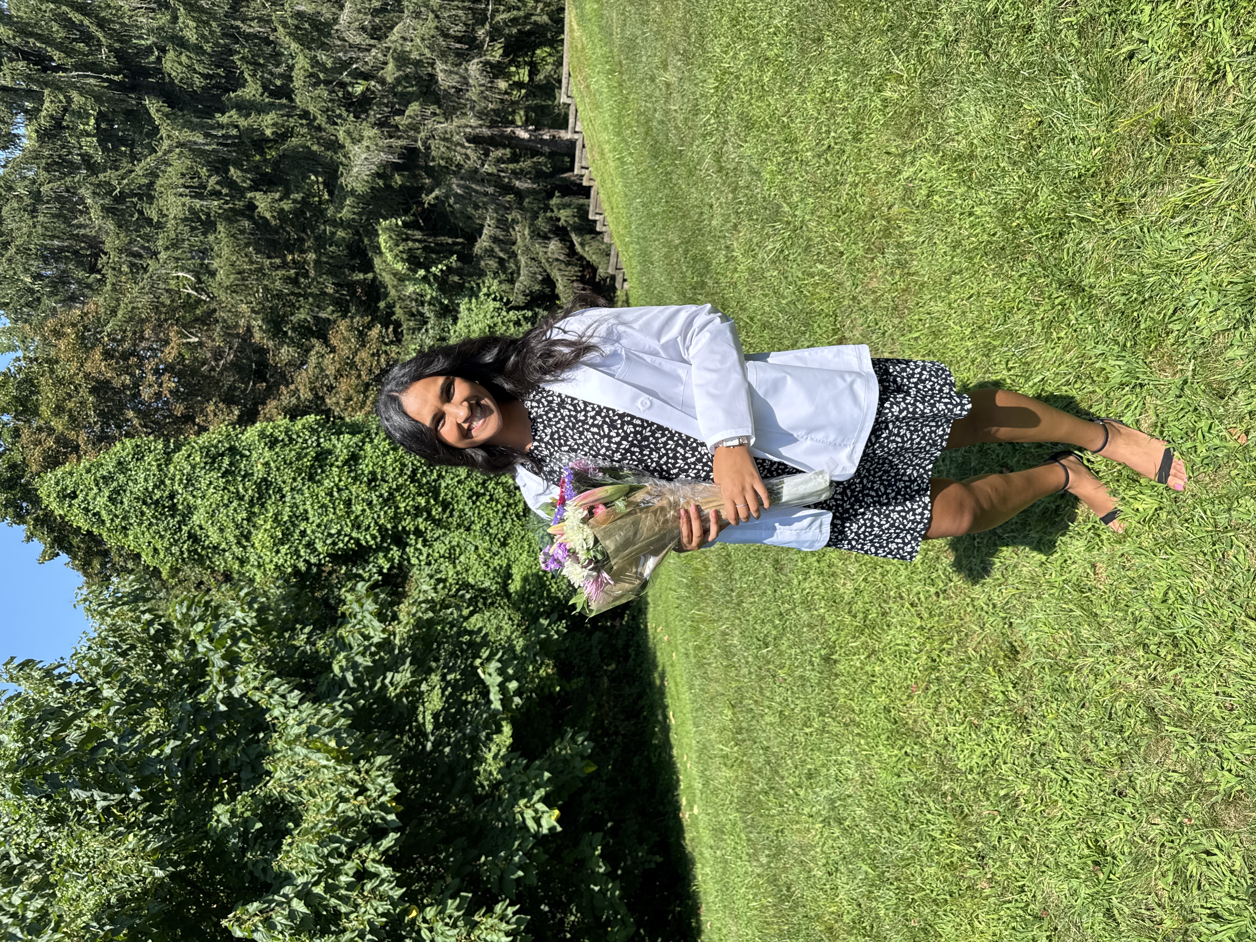 Parthenamary holding flowers