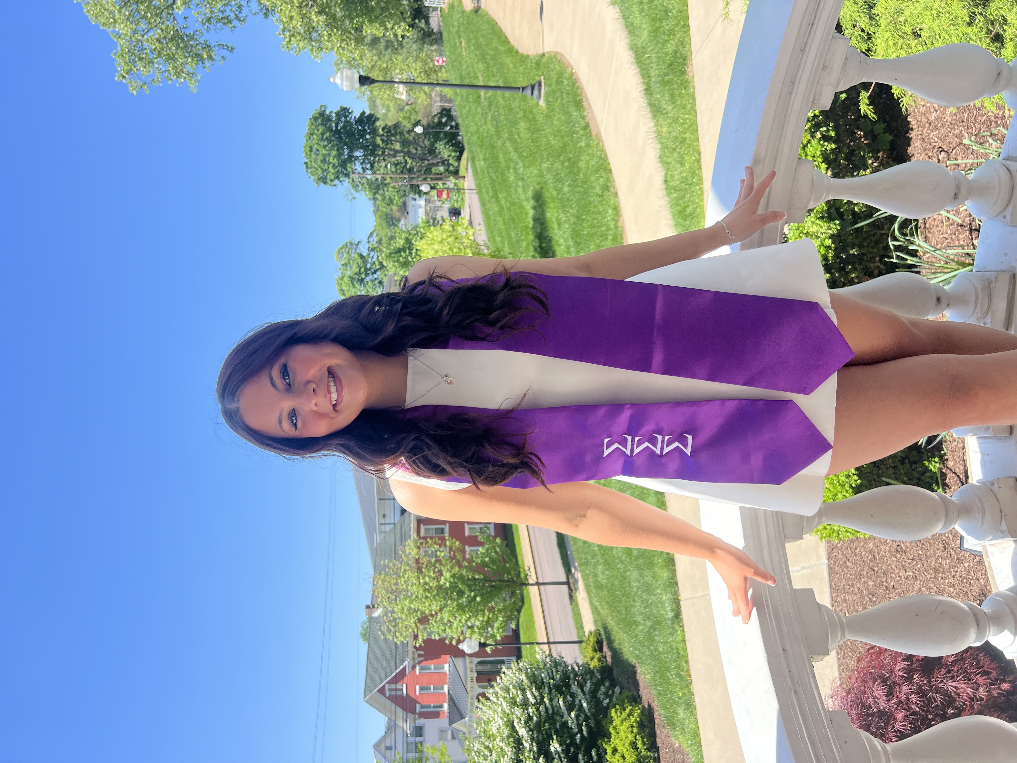 Sydney wearing a purple sash