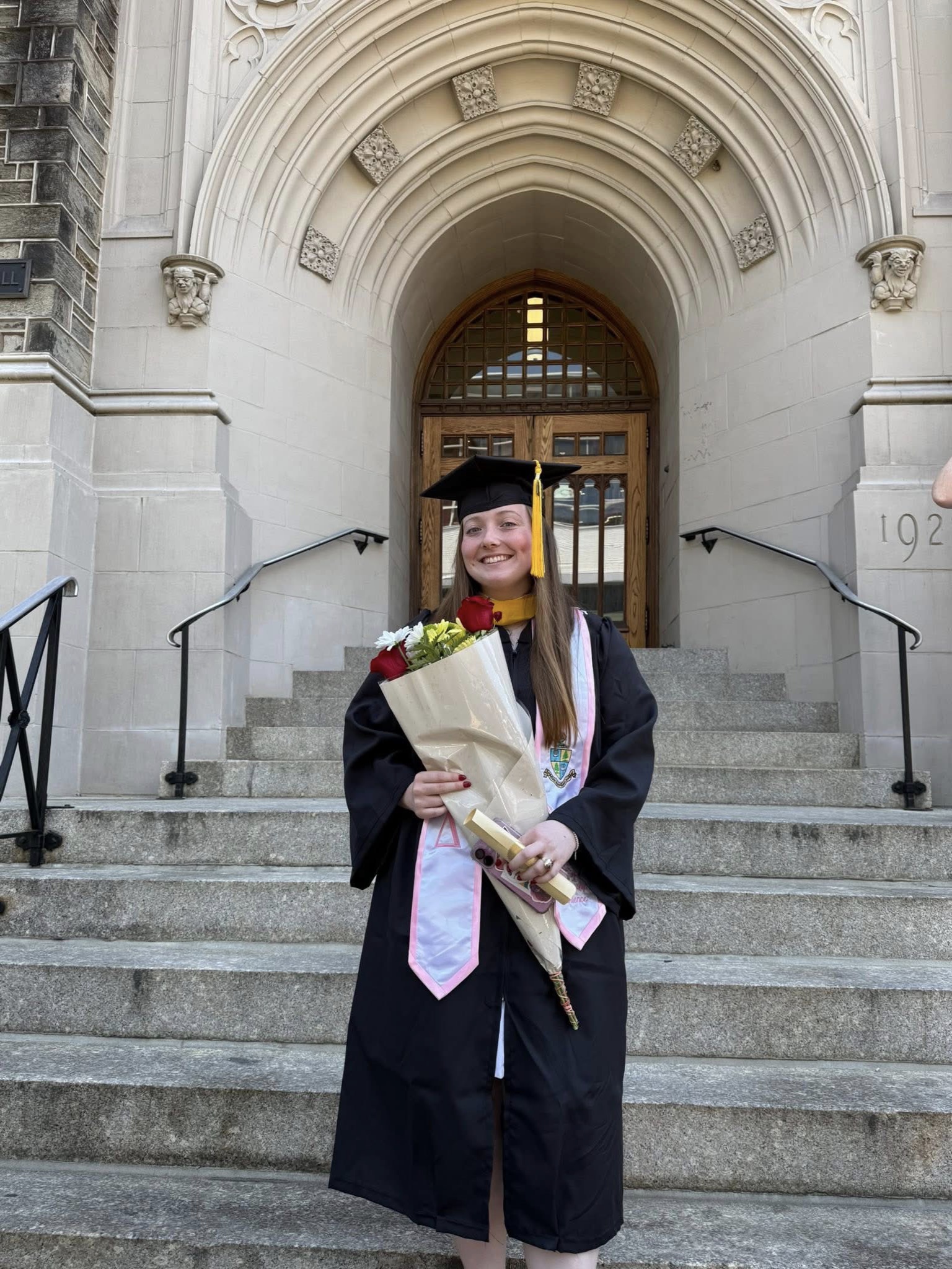 Emma wearing her cap and gown