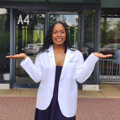 Jaylah wearing her white coat