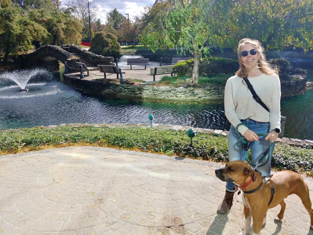 Julia Webb and her dog outside of Salus