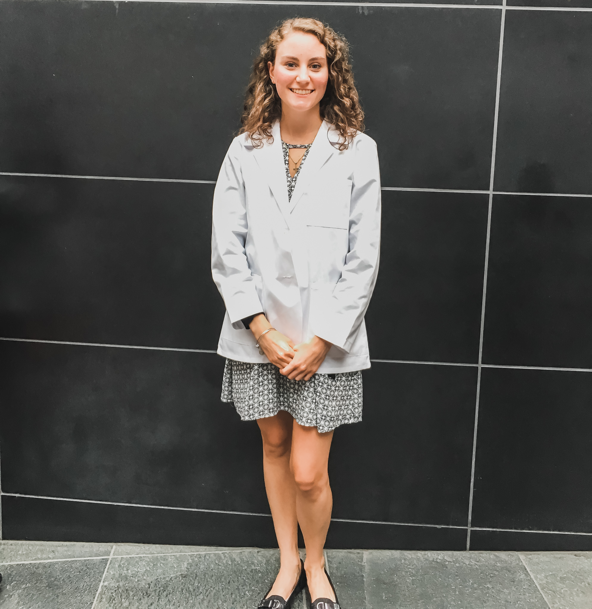 Kaylin in her white coat