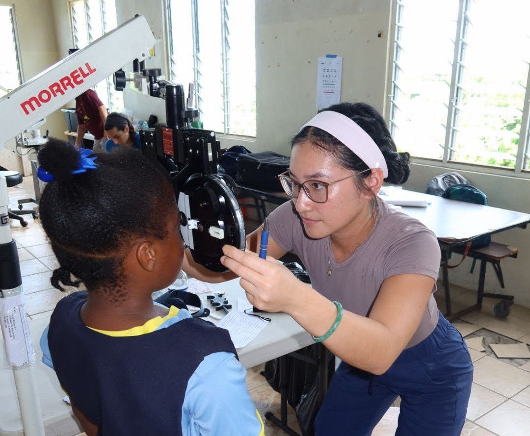 Kirsten examining patient