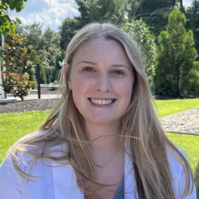 Madison wearing her white coat