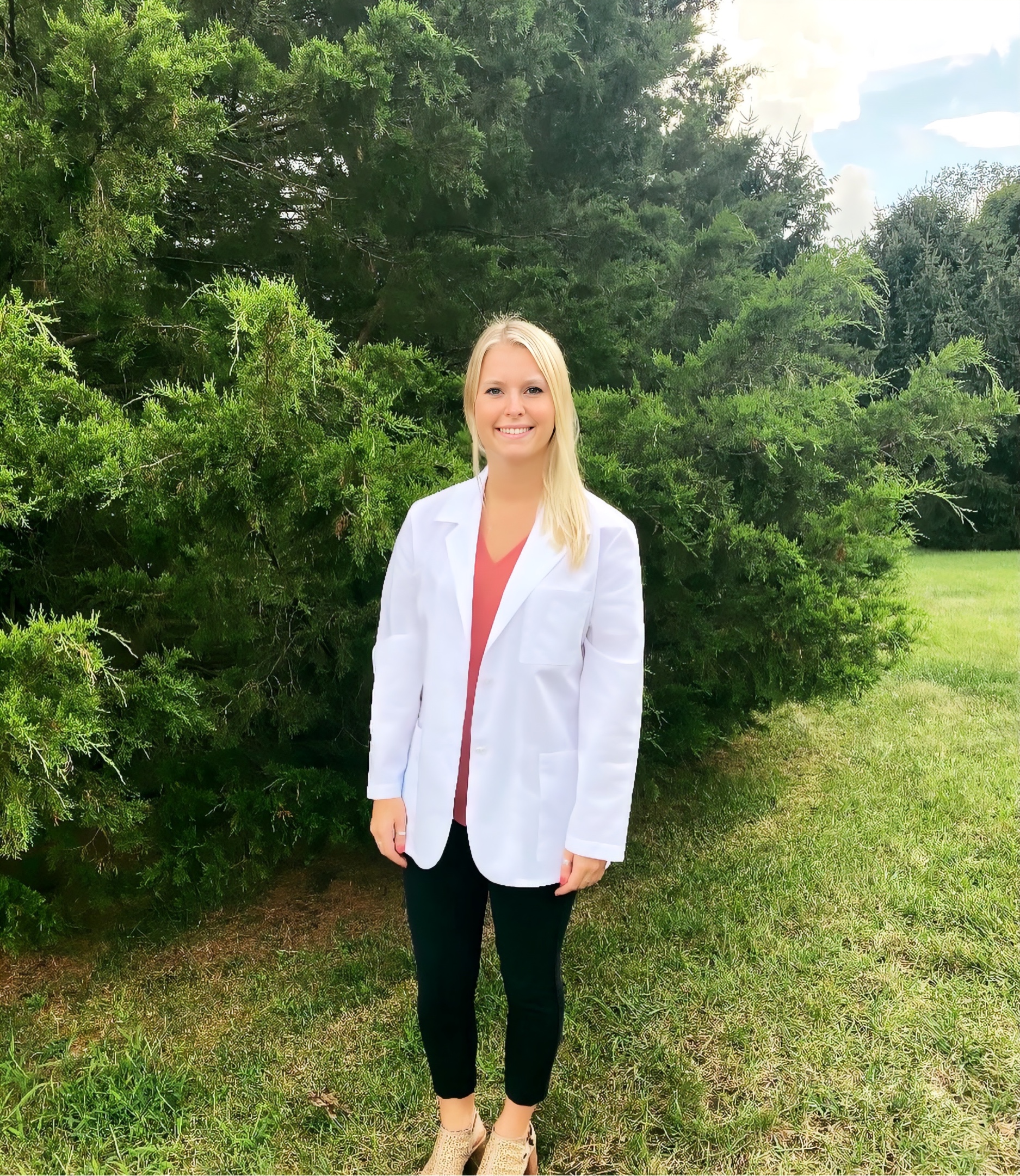 Madison Gates wearing her white coat outside