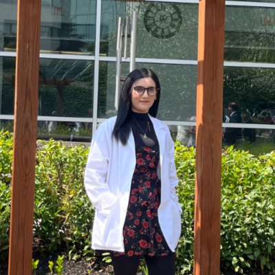 Maria standing in the sensory garden