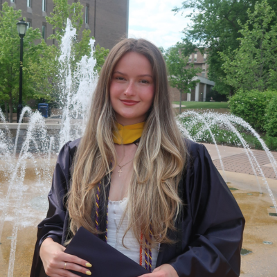 Masha in her graduation gown