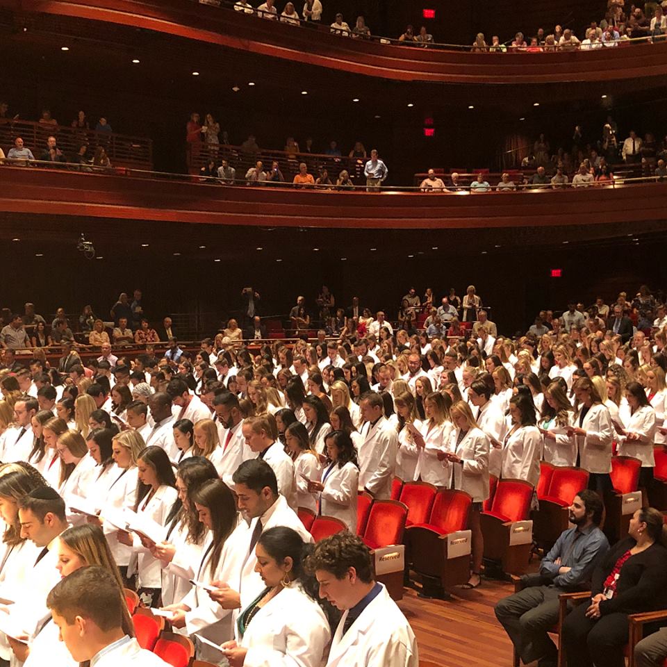 students at the white coat ceremony