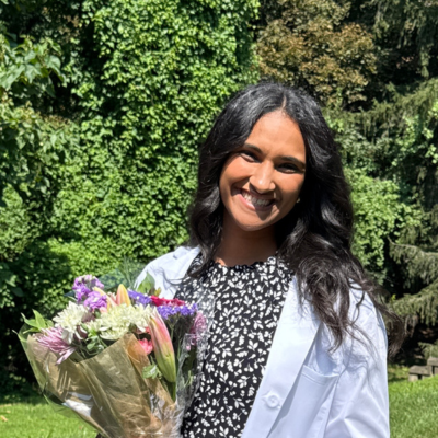 Parthenamary holding flowers