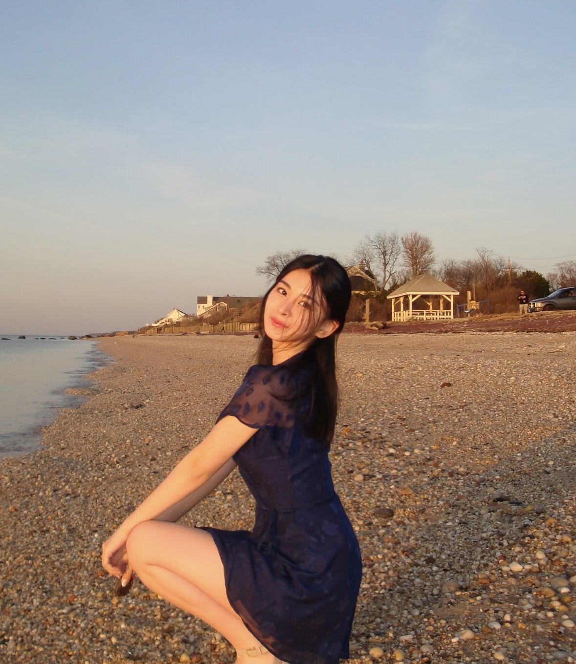 Naomi posing on the beach