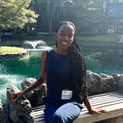 Sydney sitting hear campus fountain