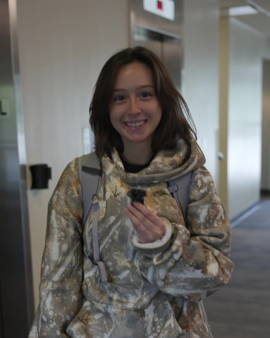 Hailey holding a microphone